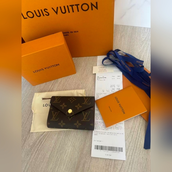 Louis Vuitton Monogram Victorine Wallet - Picture 1 of 13